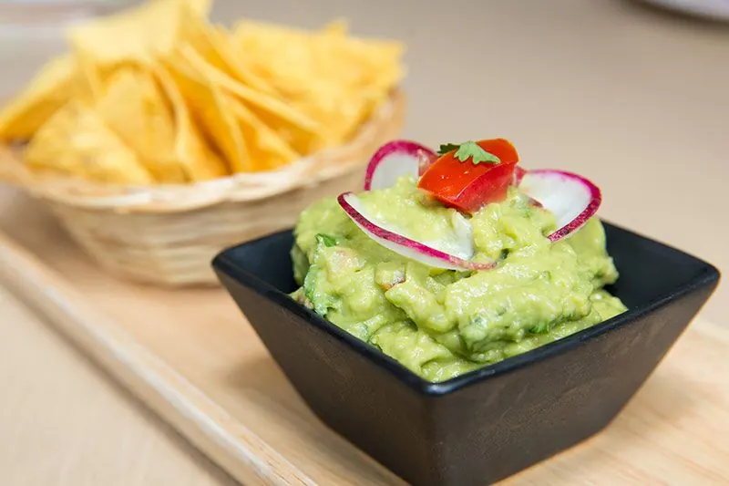 Homemade chips and guacamole